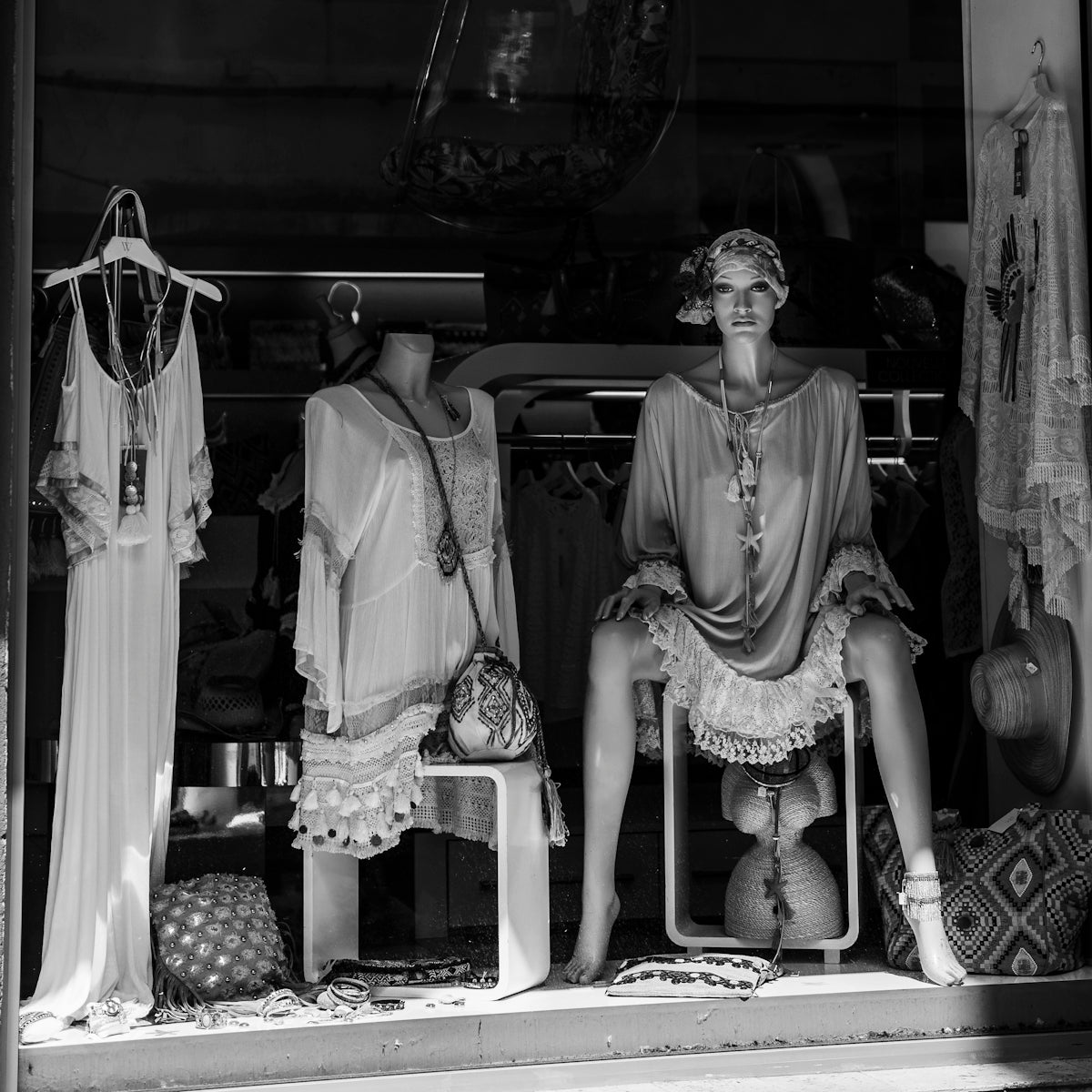 a man sitting on a stool